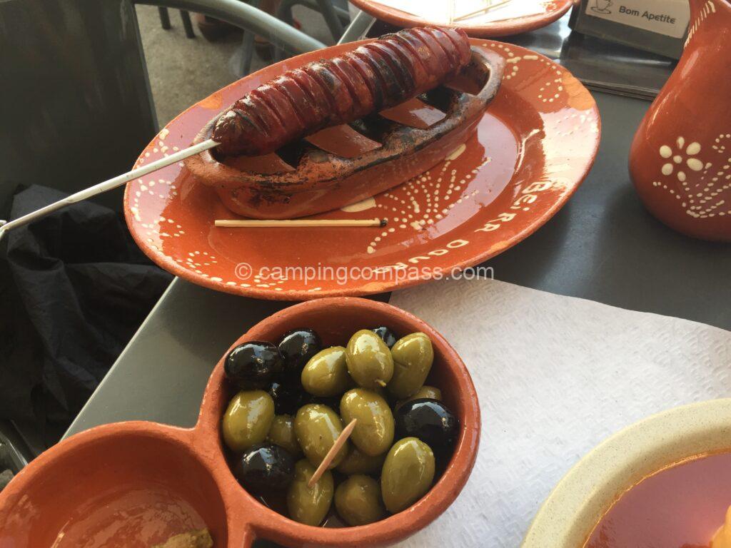 Tasting food at campsite in Portugal
